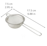 a stainless steel strainer with a handle and measurements